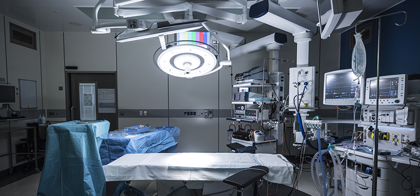 An operating room full of biomedical equipment, but no people